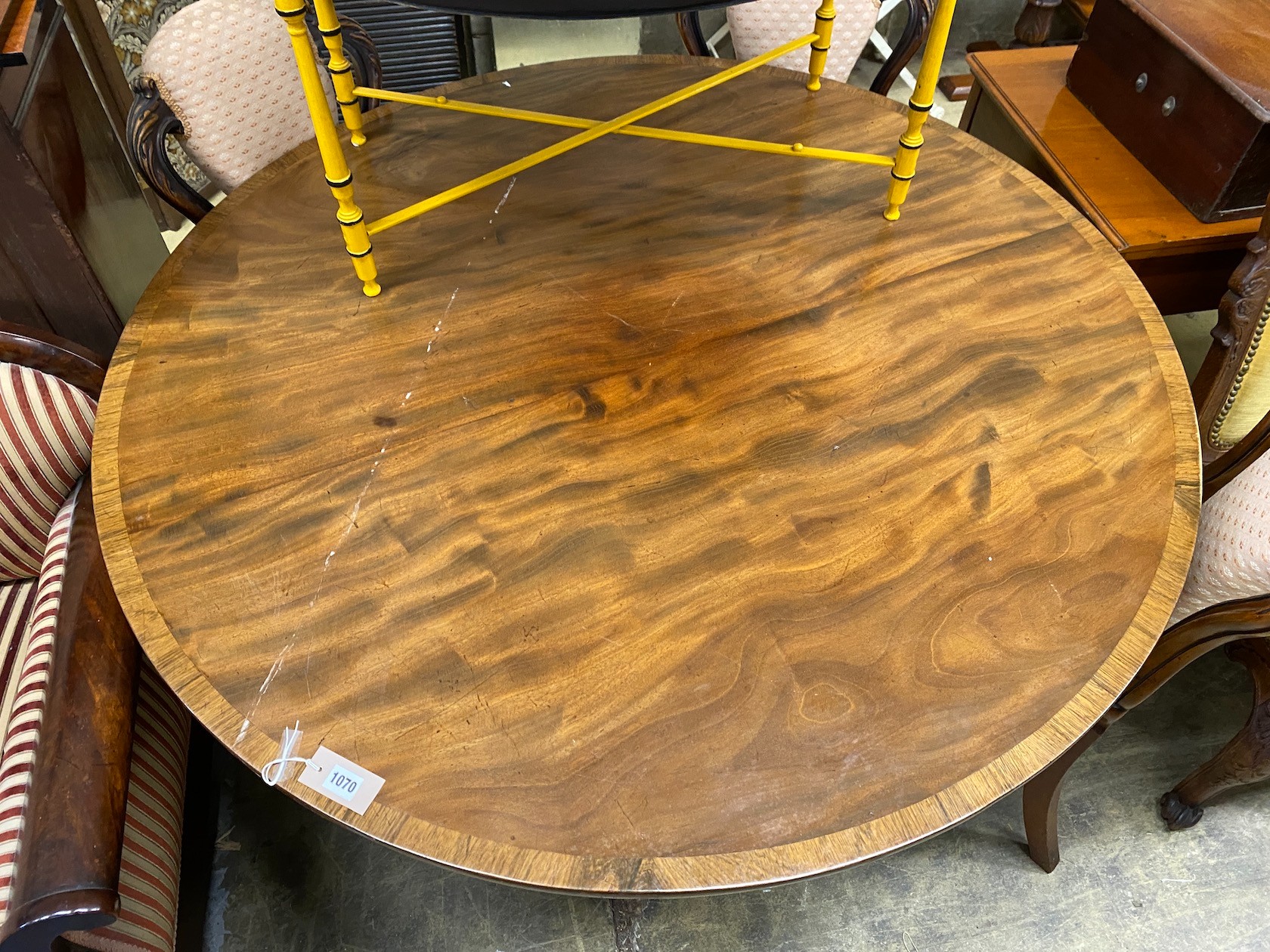 A 19th century Continental mahogany circular tilt top breakfast table, diameter 128cm, height 71cm
